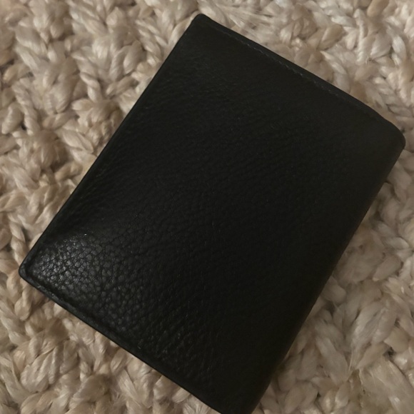 Real prada wallet black leather with red interior
Great condition - Picture 3 of 3